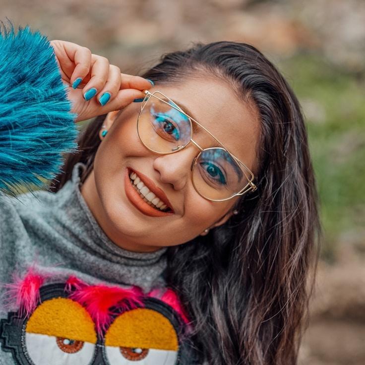 Aarav Patel, Lead Design Curator at Clock Work Vivid Mellow, reviewing corporate floral arrangements